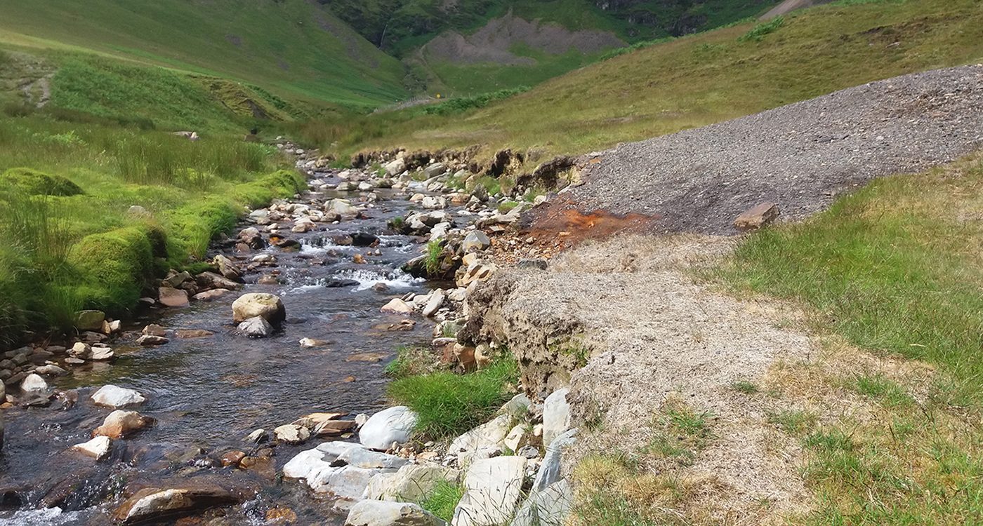The Coledale Beck with spoil material adjacent to the stream